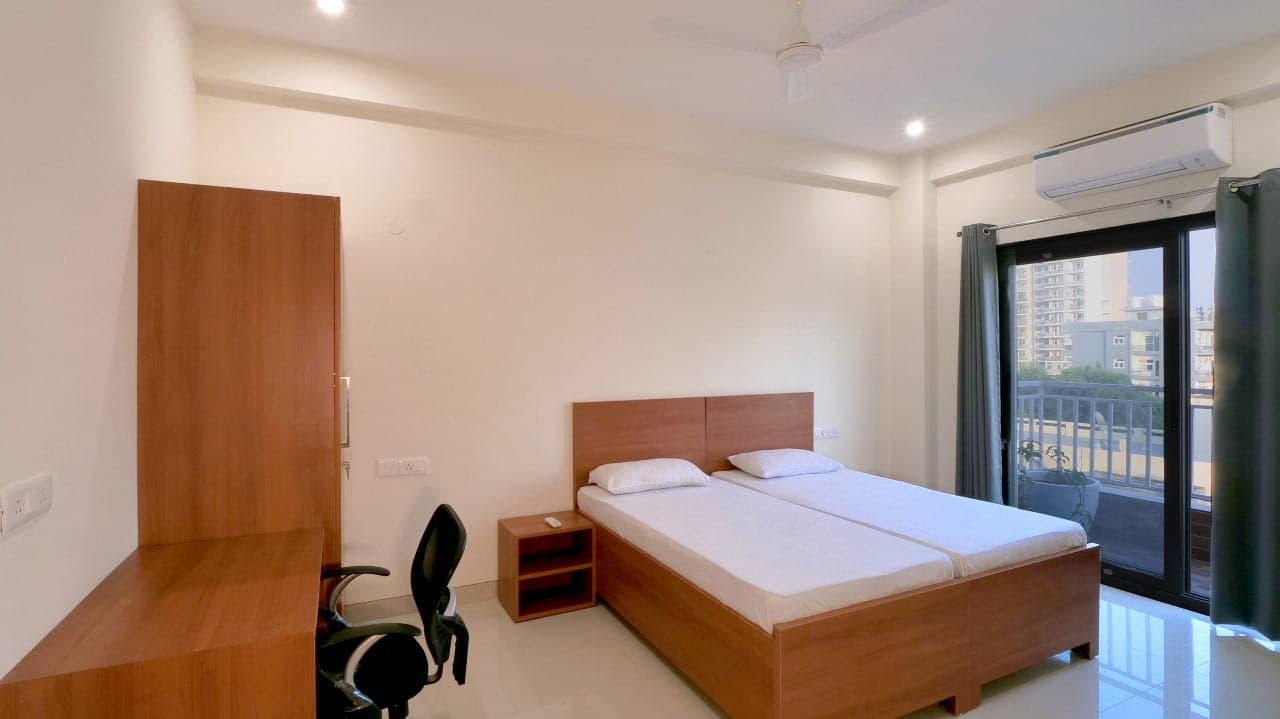 Bedroom with wardrobe and desk