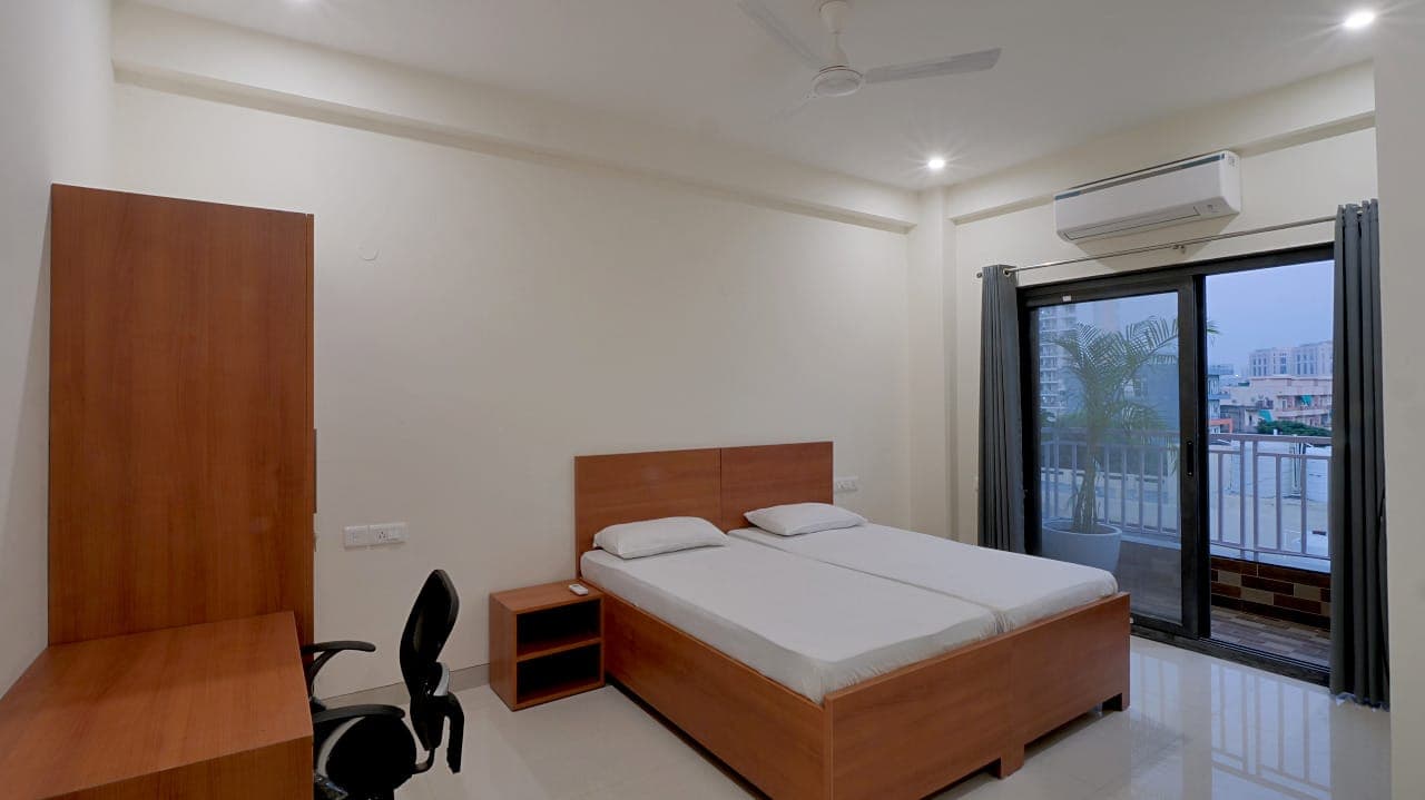 Bedroom with balcony access