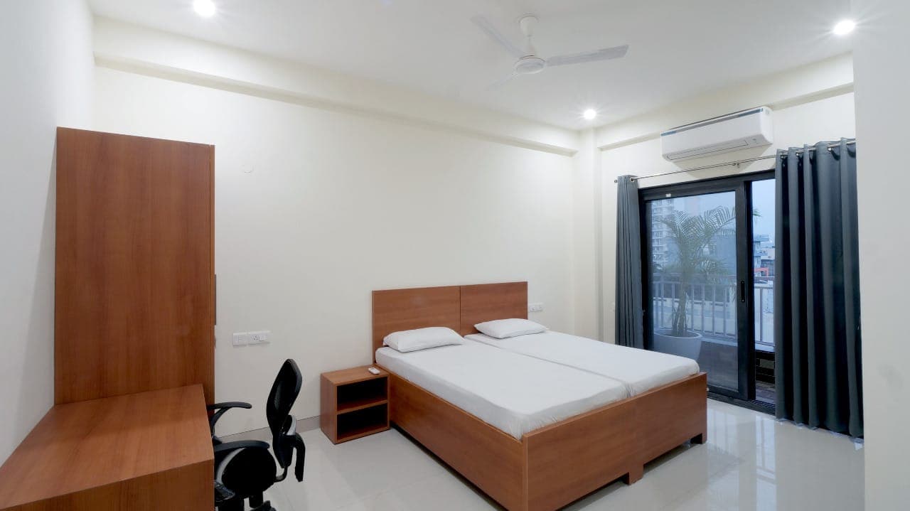 Bedroom with workspace