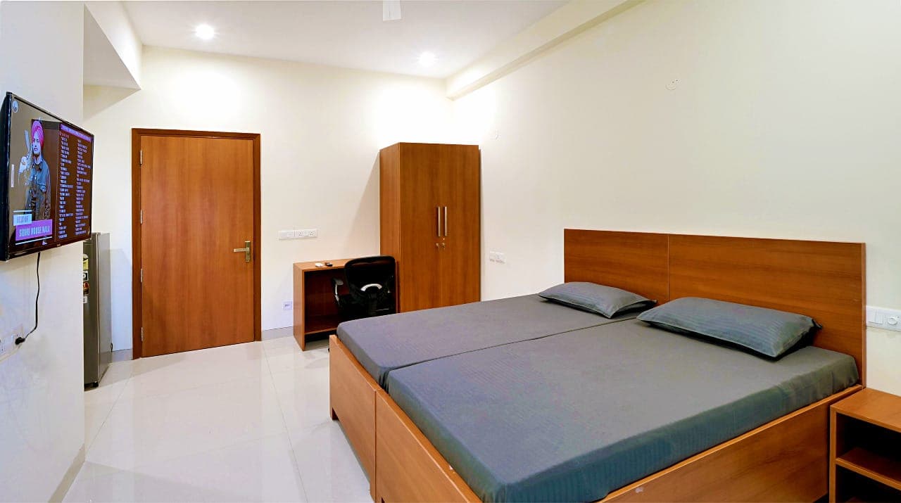 Furnished 1 BHK residence bedroom